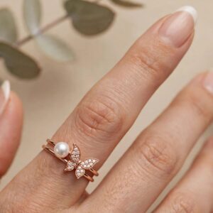 R182 ANILLO DOBLE CON PERLITA Y MARIPOSITA