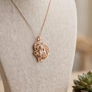 DJ118 DIJE DE CORAZON VIRGEN MARIA Y  NIÑO JESUS 18K