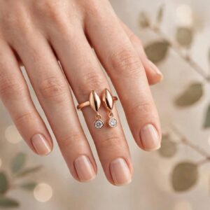 R342 ANILLO CON DOS PIEDRITAS COLGANTES 18K