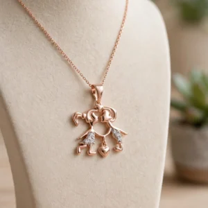 DJ175 DIJE DE NIÑO Y NIÑA CON CORAZON 18K