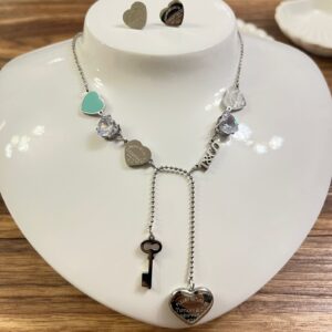 JAP012 JUEGO DE COLLAR CORAZON CRISTAL CELESTE Y ARETES TIFANNY