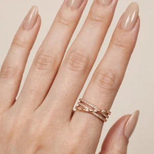 18016 ANILLO ABIERTO CON PIEDRAS 18K
