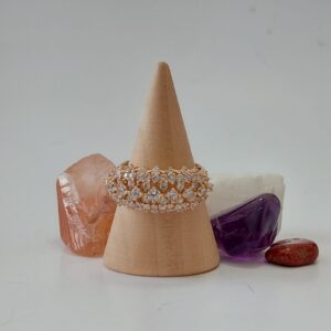 18044 ANILLO ANCHO CON PIEDRAS 18K