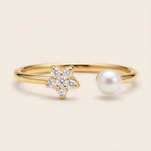 AND001 ANILLO DE NIÑA ESTRELLA CON PERLA 18K