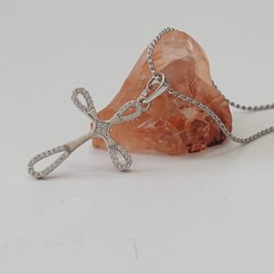 DR003 DIJE DE RODIO DE CRUZ CON BRILLOS