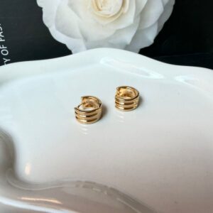 A18831 ARETE CON LINEAS 18K