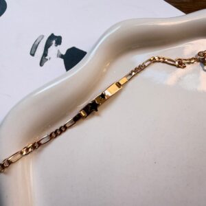 P18335 PULSERA CARTIER DE NIÑA CON GRABADO DE ESTRELLAS NEGRA 14+2CM 18K