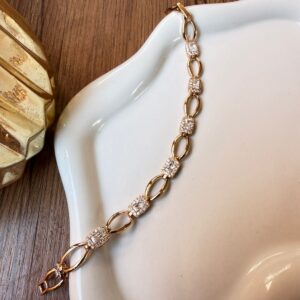 P18367 PULSERA ESLABONES OVALADOS Y PIEDRAS CUADRO CON BRILLO 17+2CM 18K