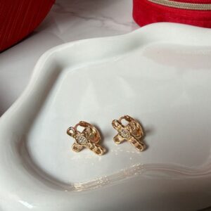 A18891 ARETE DE CRUZ CON BRILLOS 18K