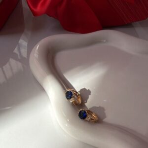 A18932 ARETE CON PIEDRA AZUL 18K