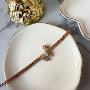 P18388 PULSERA CUBANO CON DIJE DE CABALLO CON BRILLOS 17CM 18K