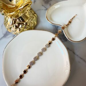 P18400 PULSERA CON FLORES LISO Y CON BRILLOS 17+2CM 18K