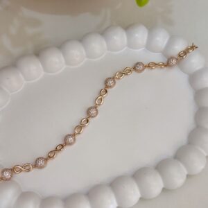 P18438 PULSERA CON BRILLOS CIRCULARES 17+3CMS 18K