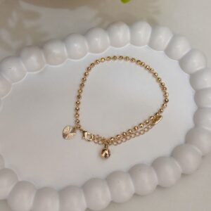 P18443 PULSERA ESLABON DE CUENTAS CON DIJE DE CORAZON 17+5CMS 18K