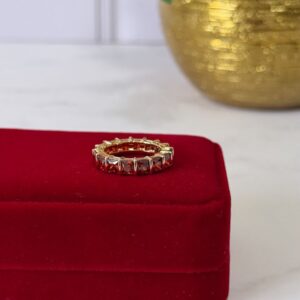 18115 ANILLO CON PIEDRAS ROJAS 18K