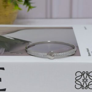BR025 BRAZALETE CON HILERA DE CRISTALES Y CORZON 57MM RODIO