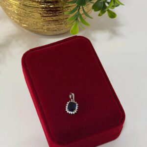 DR012 DIJE DE PIEDRA AZUL Y CRISTALES AL REDEDOR