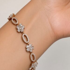 P18584 PULSERA ESLABON OVALADO CON BRILLOS Y FLOR CON PIEDRAS 16+2+2CM 18K
